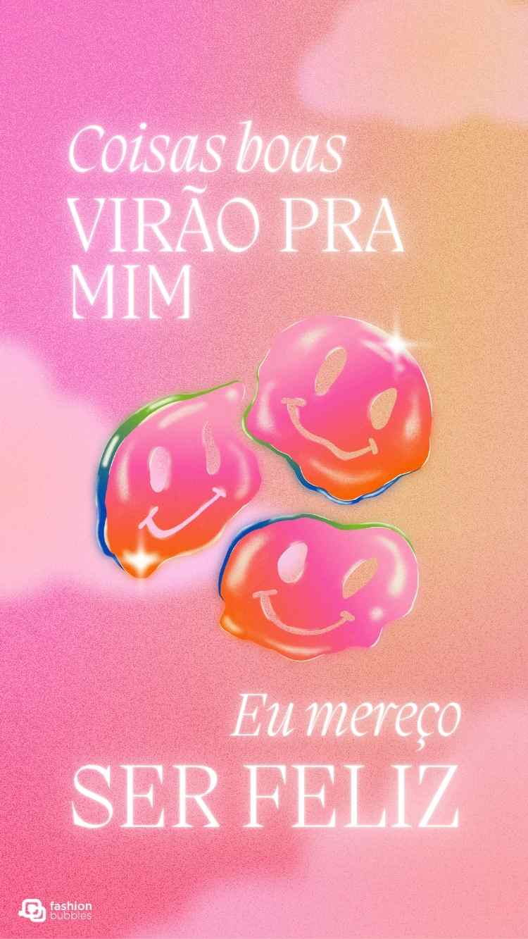 Frase poderosa escrita em branco em fundo rosa e laranja com desenhos de três smiles.
