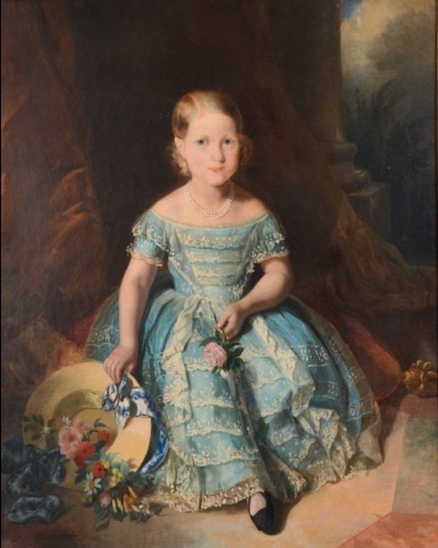 Pintura de Ferdinand Krumholz da Princesa Isabel do Brasil com 7 anos de idade, posando com um vestido azul e chapéus na mão. Pintura de Ferdinand Krumholz da Princesa Isabel do Brasil com 7 anos de idade, posando com um vestido azul e chapéus na mão.