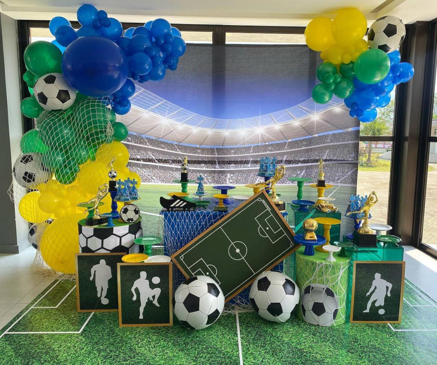 Tapete de campo de futebol e painel de estádio.