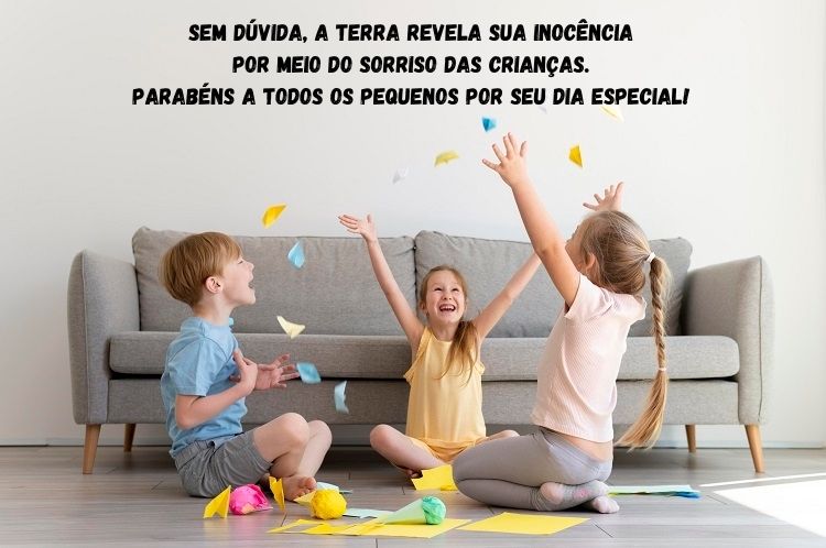 Foto de 3 crianças de pele clara jogando papeis coloridos pra cima e frase "Sem dúvida, a Terra revela sua inocência por meio do sorriso das crianças. Parabéns a todos os pequenos por seu dia especial!"