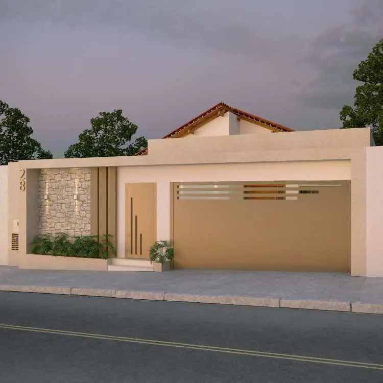 Fachada de casa moderna com muro bege, portão metálico dourado com detalhes em vidro, porta amadeirada decorativa e parede de pedra iluminada. Paisagismo com pequenos arbustos na base, número "28" em destaque e telhado cerâmico ao fundo.