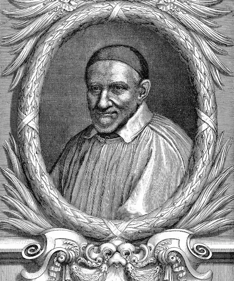 A imagem é uma gravura em preto e branco de São Vicente de Paulo, um santo católico. Ele está usando uma veste clerical e um solidéu. O retrato está dentro de uma moldura oval ornamentada com detalhes florais e arabescos. O rosto de São Vicente expressa serenidade e sabedoria.


