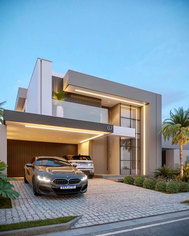 A imagem mostra uma casa moderna, pintada de bege e branco, com design limpo e linhas retas. Tem um número “07” na frente, uma garagem coberta com dois carros e um jardim bem cuidado. O céu está no crepúsculo, dando um brilho suave à cena.