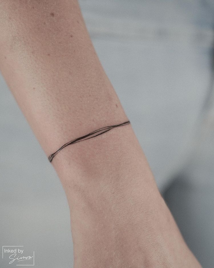 tatuagem que imita bracelete