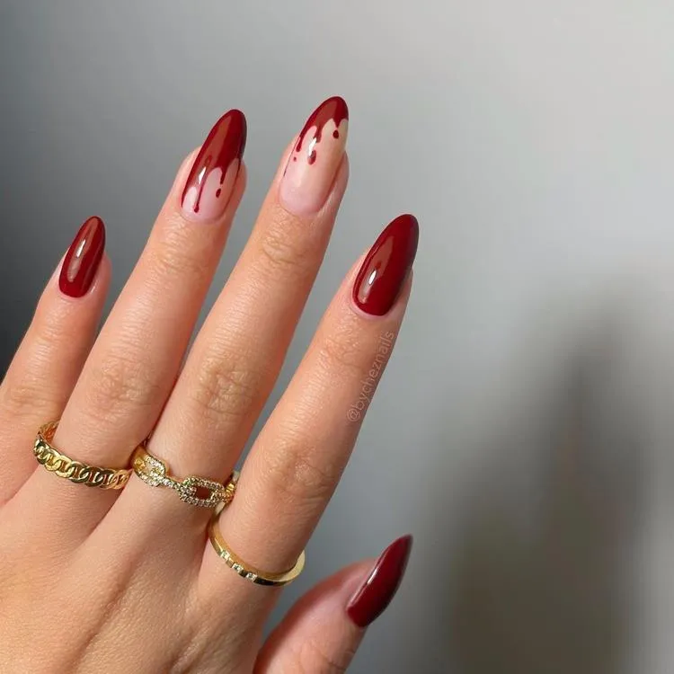 unhas vermelhas e sangue para dia das bruxas