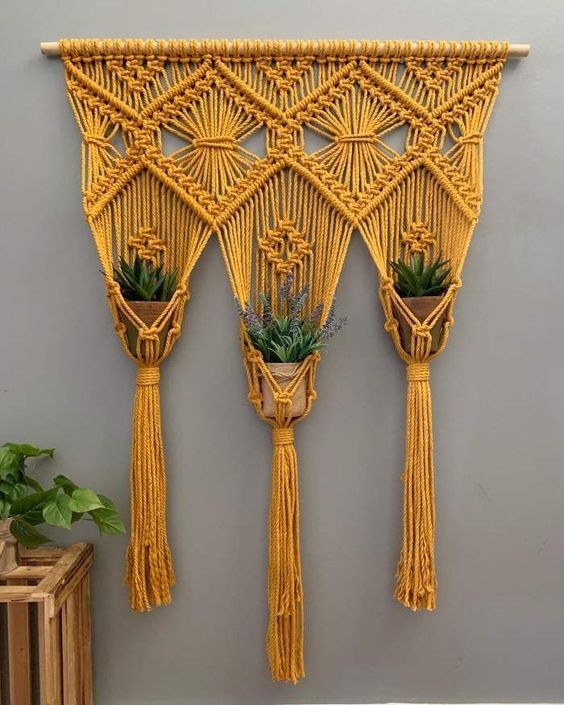 Macramê de parede para plantas.