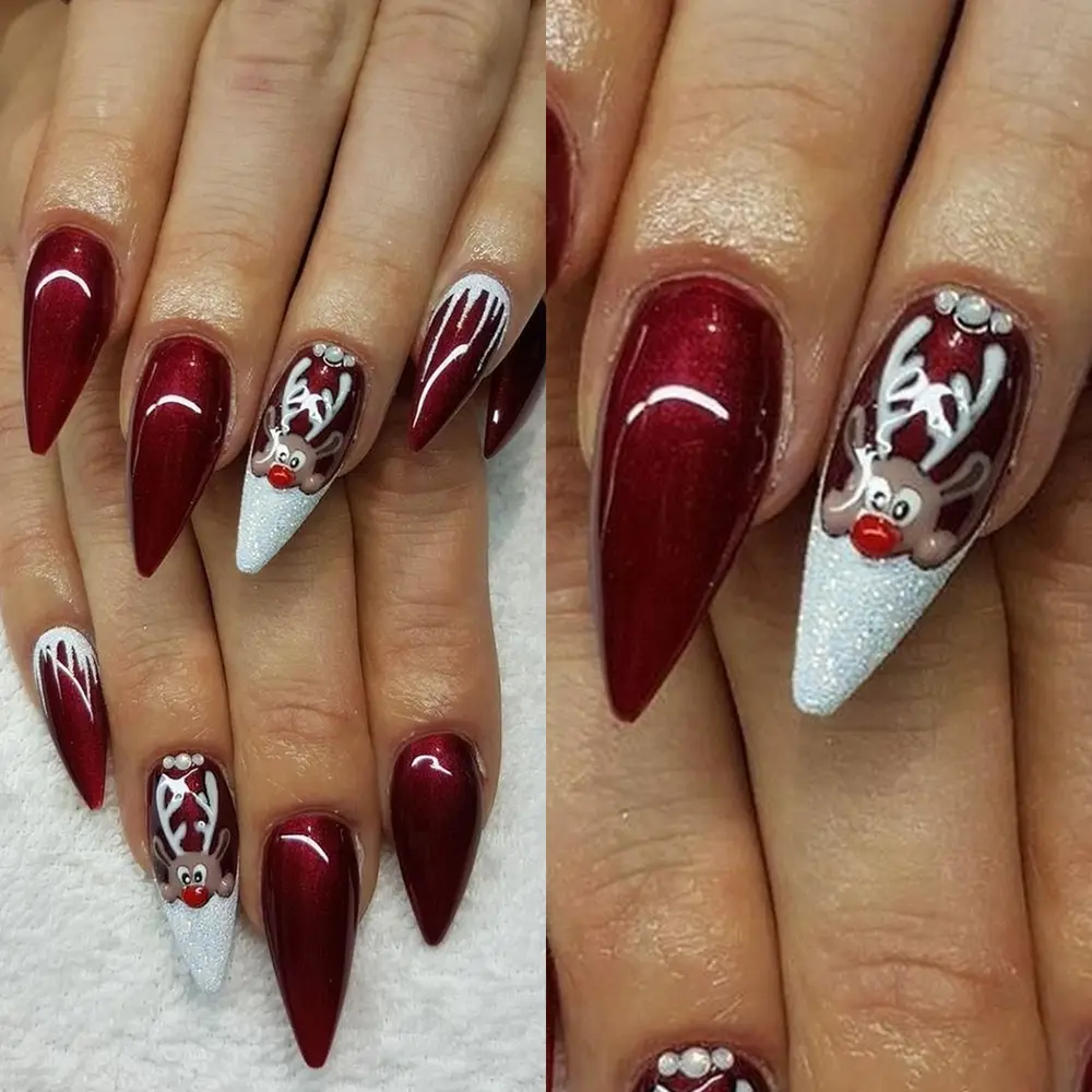 Unhas vermelhas com decoração de Henna do Papai Noel e detalhes simulando neve.