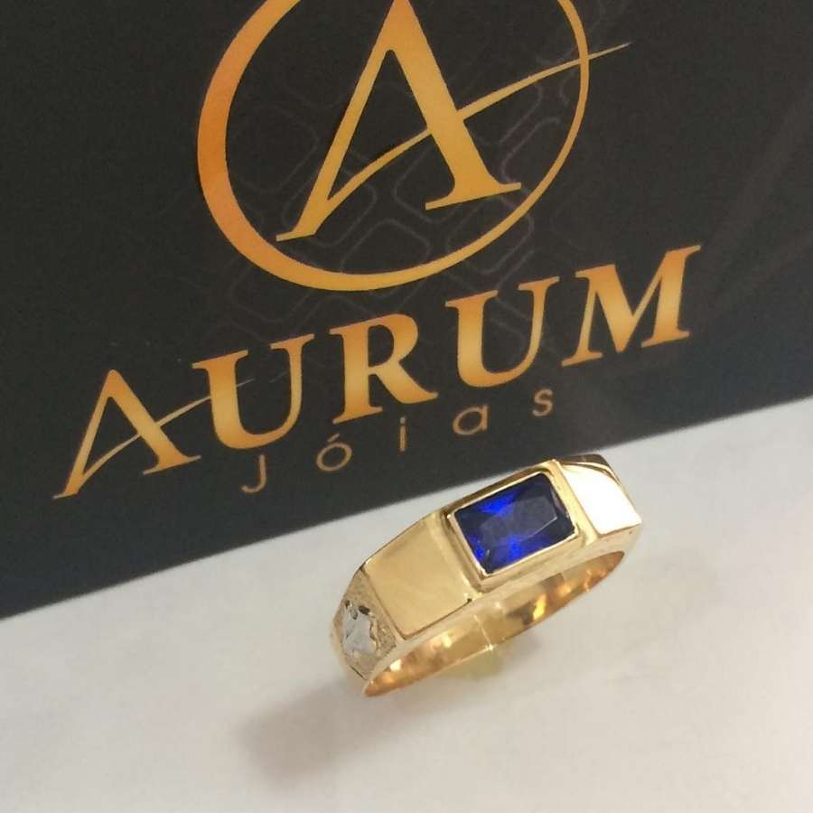 Anel masculino dourado e prateado com pedra azul