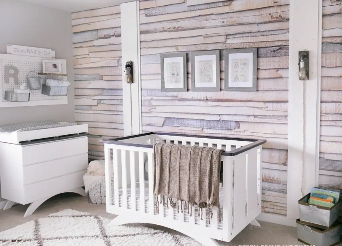 Quarto de bebê com papel de parede