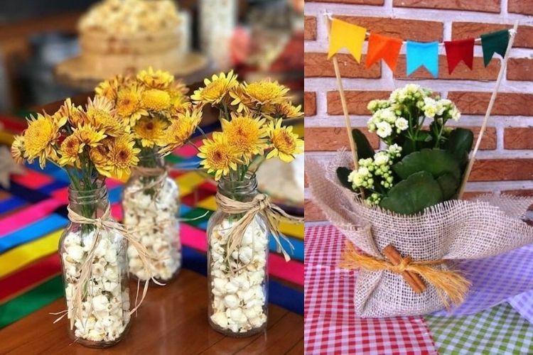 A imagem representa centro de mesa junino usando garrafas de vidro, pipoca, flores e bandeirinhas