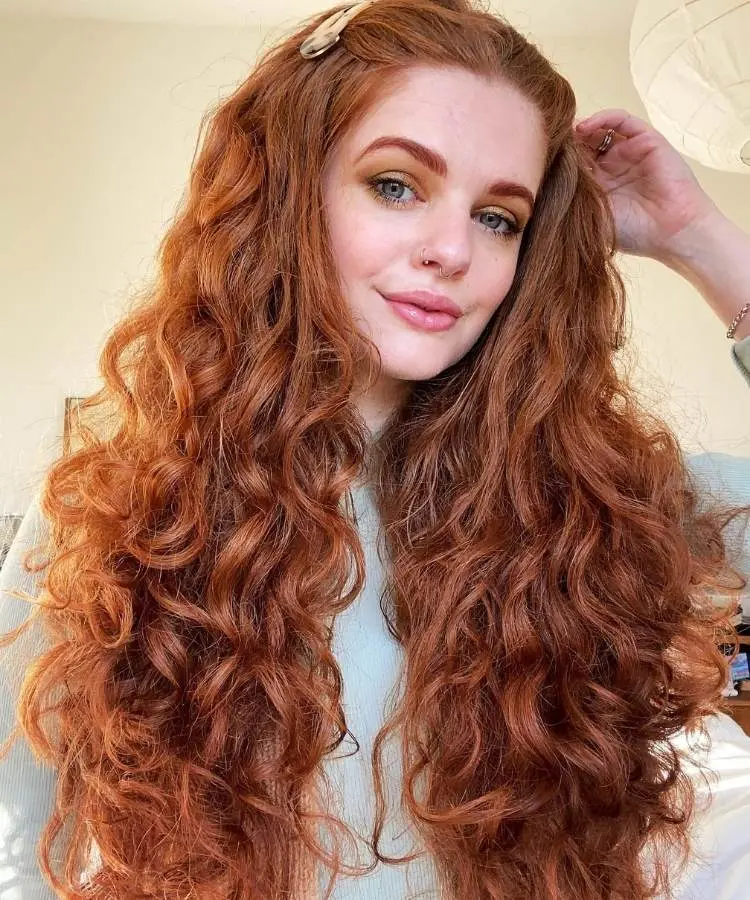 Corte cabelo longo ondulado ruivo.