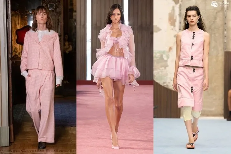 Modelos usando looks em rosa-claro na passarela