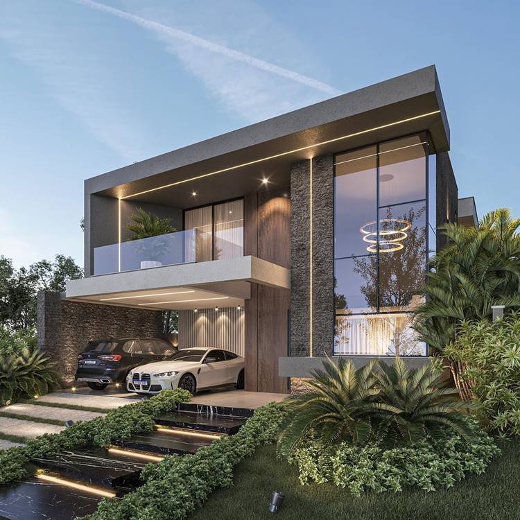 Fachada de casa moderna de dois andares, com paredes de vidro, e um design limpo e angular. Há uma garagem coberta com dois carros. A casa tem iluminação externa que a destaca contra o céu escuro. Há um jardim com grama, palmeiras e outras plantas na frente da casa