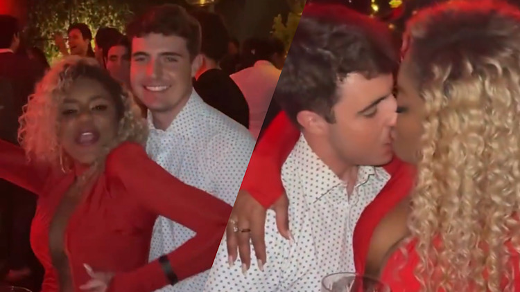 Cariúcha e João Augusto Liberato trocam beijos na festa do filho do Faustão.