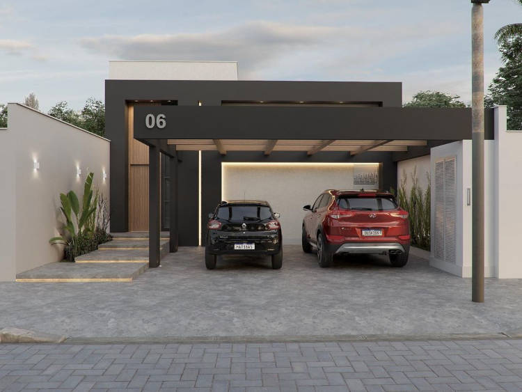 Casa com garagem coberta em ferro preto.