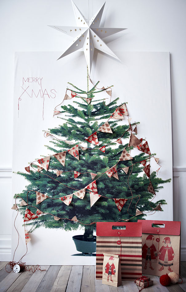 Árvore de Natal desenhada em folha e decorada com bandeirinhas