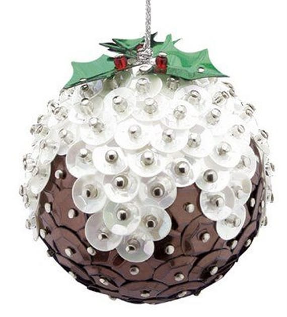 Bola de árvore de Natal com lantejoula formando fruta natalina