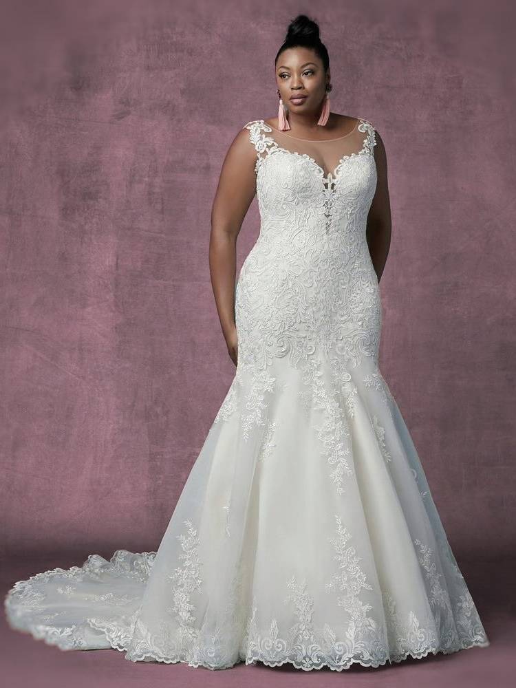 Mulher de pele negra em fundo roxo usando vestido de noiva de alças, renda e justo até o joelho