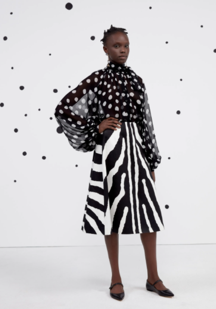 Blusa poá com saia zebra