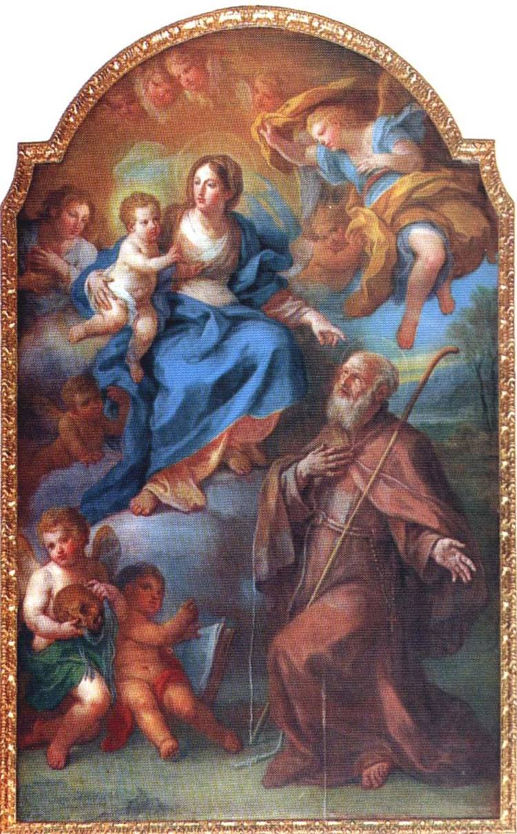 A imagem apresenta São Conrado ajoelhado em vestes simples, com um cajado e expressão de humildade, direcionando-se a Maria e Jesus no alto, cercados por anjos. A composição enfatiza devoção, graça celestial e espiritualidade contemplativa.


