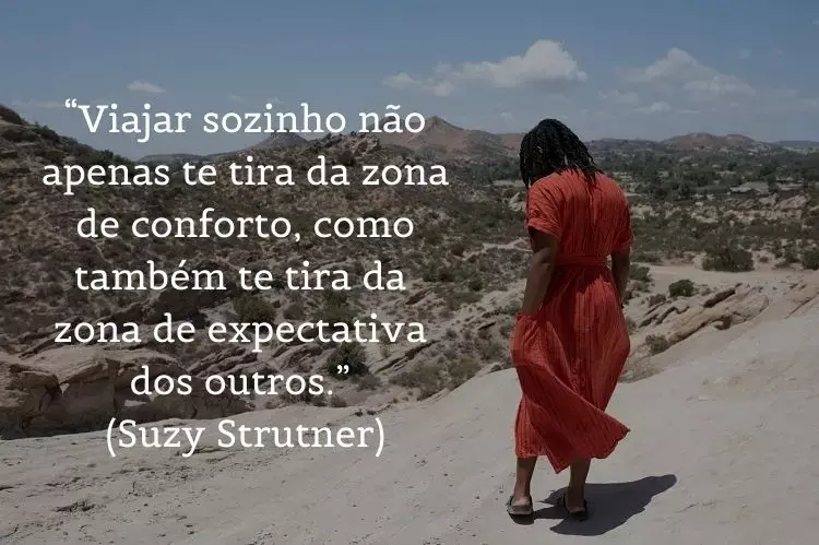 foto de mulher de vestido caminhando com frases de viagem sozinha