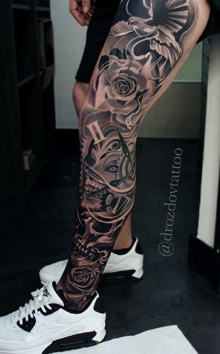 Perna fechada com tatuagens com muitas sombras, como caveira e rosas