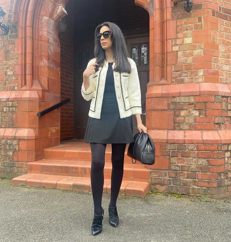 cardigan branco com detalhes em preto