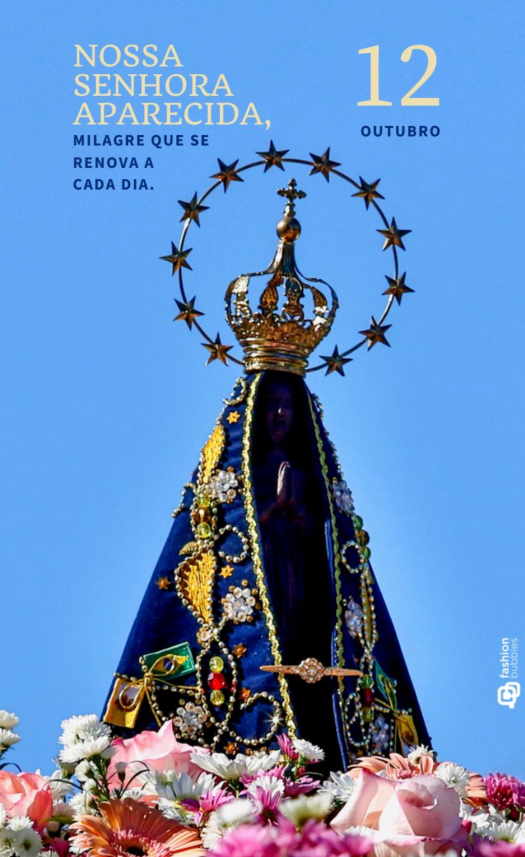 Estatua de Nossa Senhora Aparecida, com manto azul e uma coroa dourada. A santa está cercada por flores e um círculo de estrelas douradas. O texto "Nossa Senhora Aparecida, milagre que se renova a cada dia" e "12 de outubro" está ao lado da imagem.