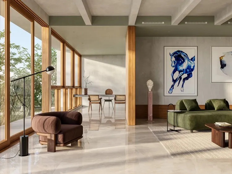 Sala com paredes cinzas, janelas de vidro, quadro de cavalo azul, poltrona marrom, luminária de pé, mesa ao fundo, sofá verde musgo e mesa de centro marrom 