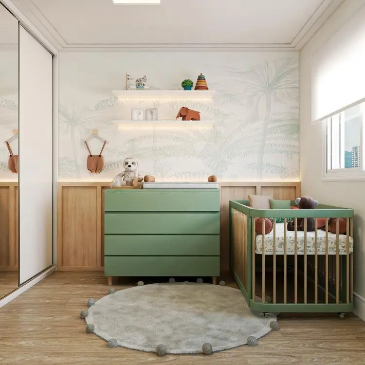 Quarto de bebê com cômoda e berço pintados de verde 