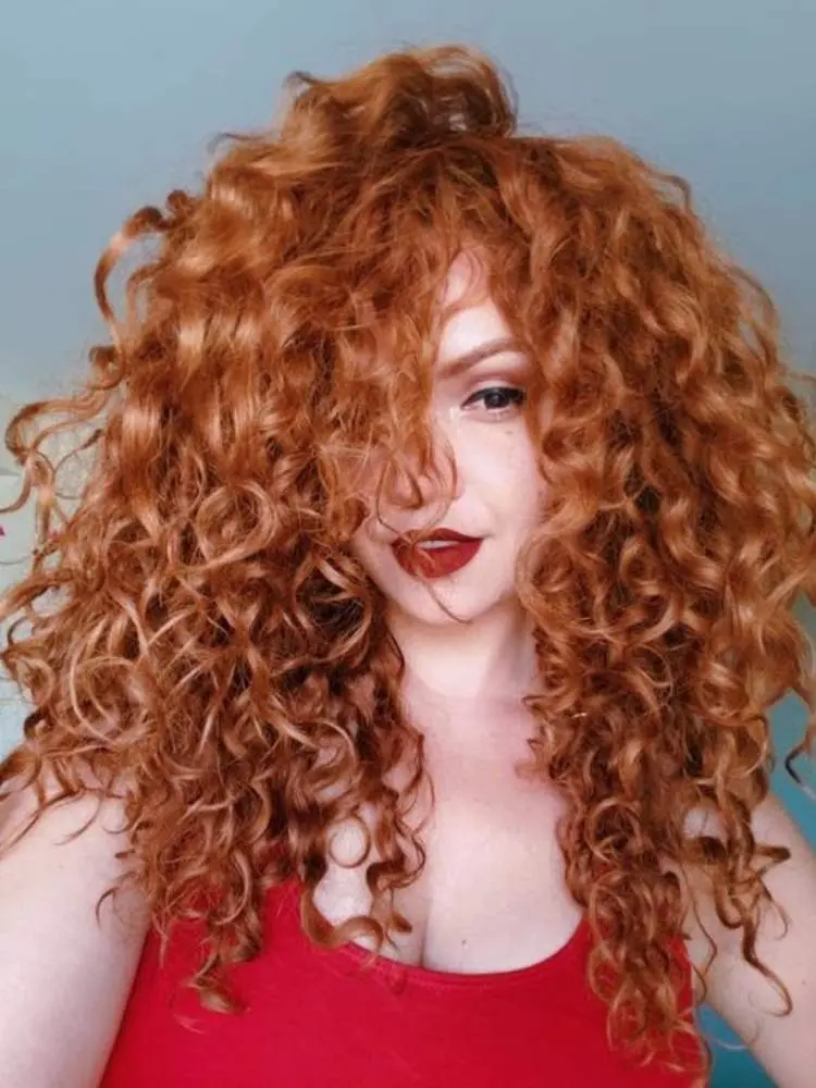 Foto corte de cabelo longo repicado cacheado.