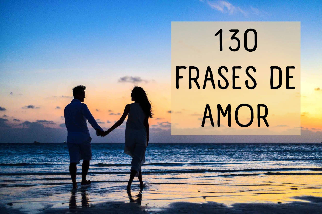 foto de casal caminhando na praia