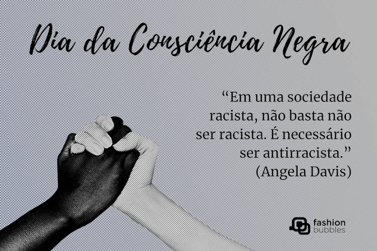 Cartão virtual pixelado com foto de mão de pele negra e de pele clara dadas, além de frase Em uma sociedade racista, não basta não ser racista. É necessário ser antirracista.” (Angela Davis)