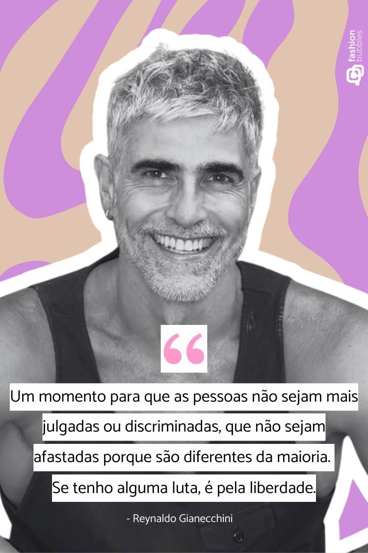 Um homem sorridente com cabelo grisalho e barba posa contra um fundo em tons de laranja e roxo. A imagem inclui uma citação de Reynaldo Gianecchini sobre a importância de as pessoas não serem julgadas ou discriminadas.