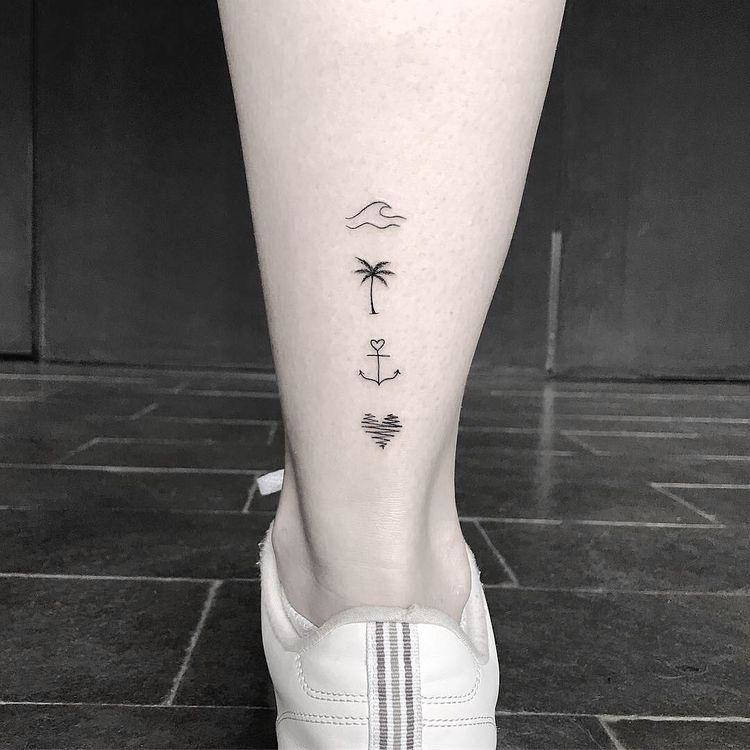 Tatuagem na perna de onda, coqueiro, âncora e coração