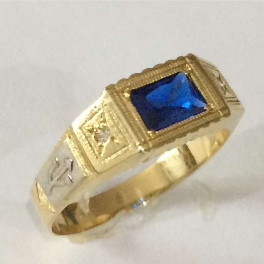 Anel masculino dourado e prateado com pedra azul