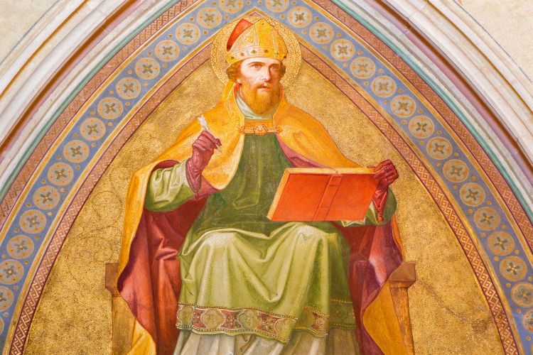 Pintura de Santo Agostinho sentado, usando roupa verde e segurando livro 