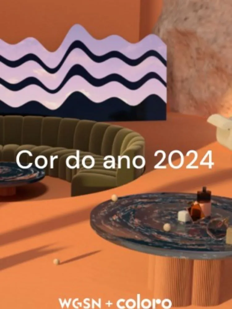 Sala em tom Apricot Crush com sofá verde, quadro preto, branco e amarelo e mesa de canto com pé em Apricot Crush.