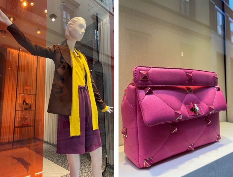 Vitrine Valentino Milão, tendências verão 2023, cores energéticas, bolsa pink Vitrine marca Valentino modelo usa bermuda cor uva cachecol amarelo e blazer marrom foto da direita bolsa Valentino pink