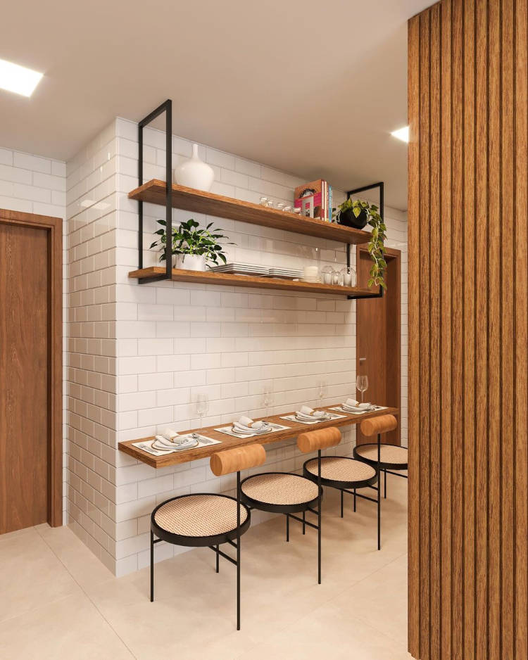 Cantinho para refeições rápidas no corredor do apartamento.