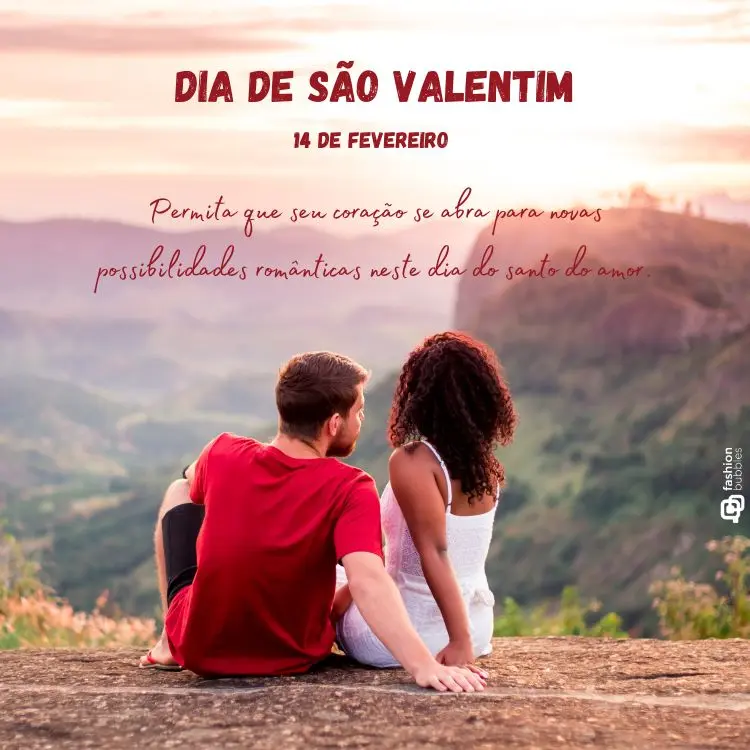 A imagem mostra um casal sentado em uma paisagem montanhosa ao pôr do sol. No topo, há o texto "Dia de São Valentim - 14 de fevereiro", acompanhado de uma mensagem incentivando a abertura para possibilidades românticas neste dia especial.