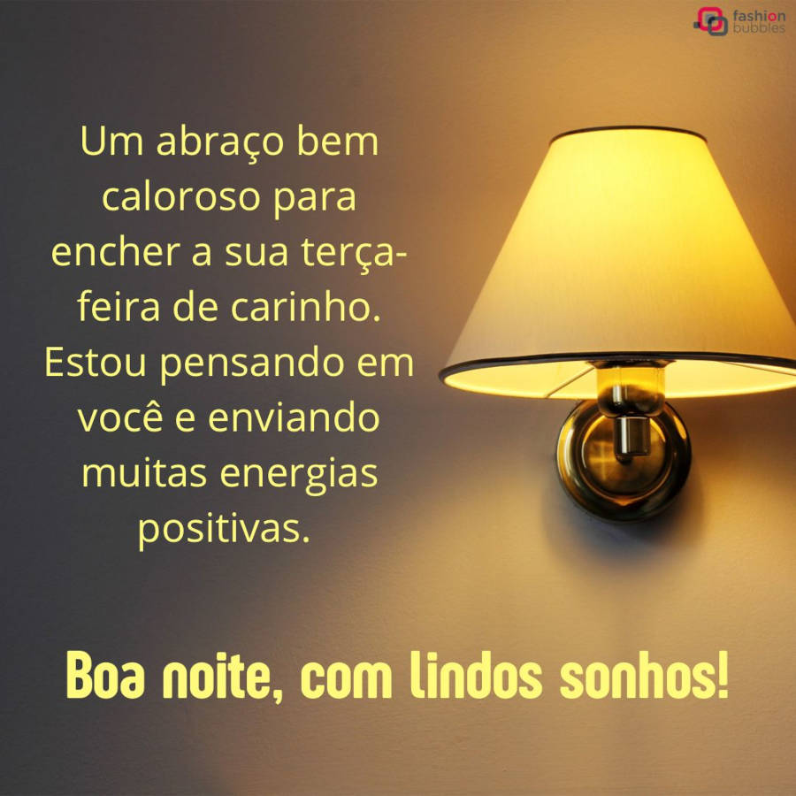Foto de luminária com luz amarela, com frases de boa noite em volta: Um abraço bem caloroso para encher a sua terça-feira de carinho. Estou pensando em você e enviando muitas energias positivas. Boa noite, com lindos sonhos!