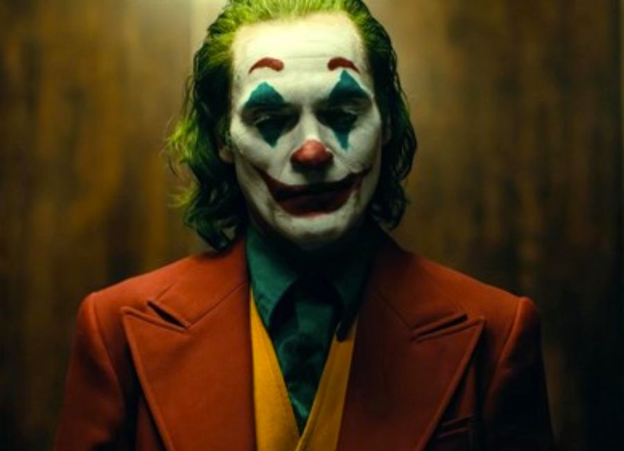 O ator Joaquin Phoenix caracterizado como Coringa