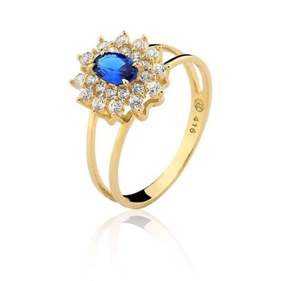 Anel dourado com brilhante e pedra azul