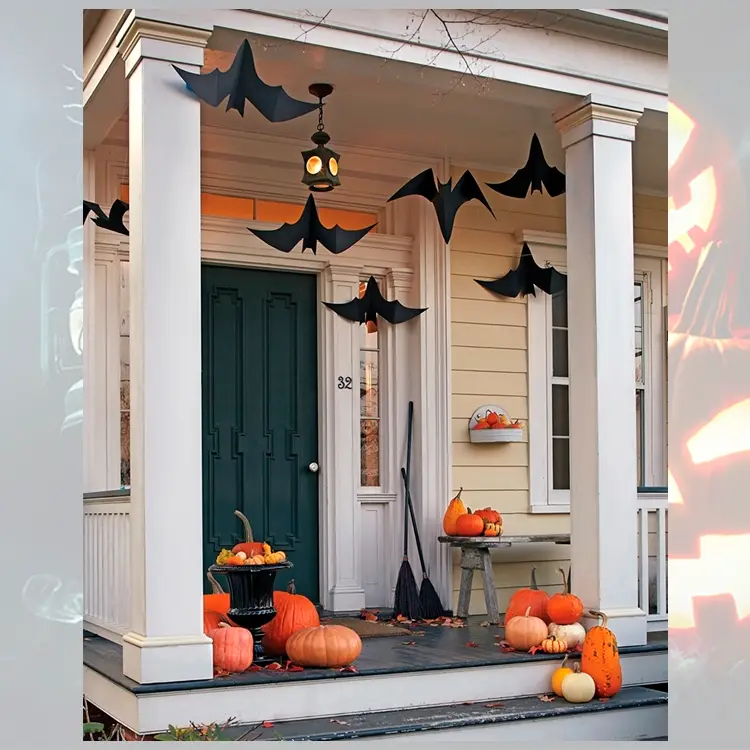 Foto de decoração de porta para o Halloween. Morcegos dormindo pendurados, abóboras