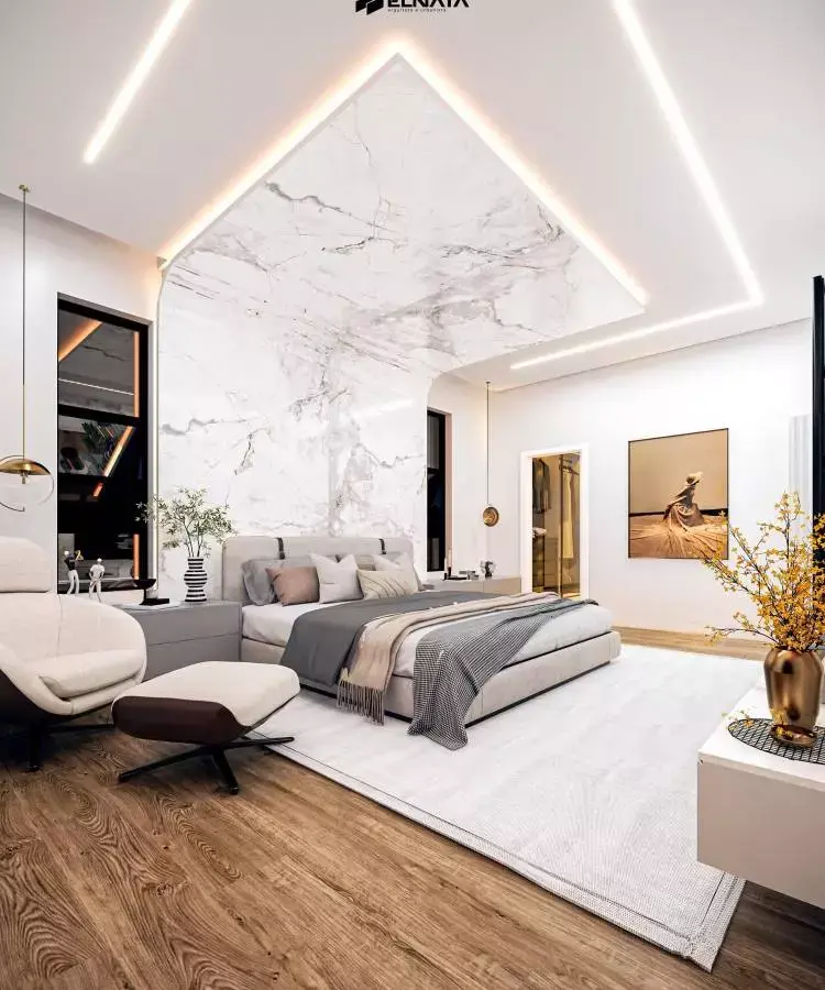 Dormitório de luxo para marido e mulher, com parede decorada com mármore, tapete grande, poltrona e quadros