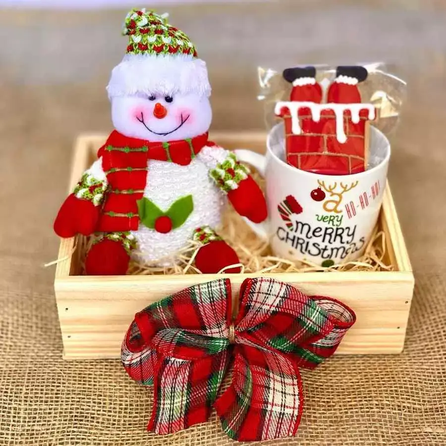 Foto de caixotinho com papai noel e caneca.