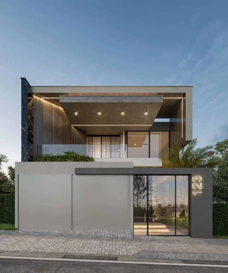 Fachada de casa contemporânea com linhas retas e elegantes. Muro moderno simples em tons cinza e preto, com numeração dourada iluminada. Vidros amplos refletem o ambiente externo, paisagismo com plantas verdes, calçada pavimentada e céu azul ao entardecer.