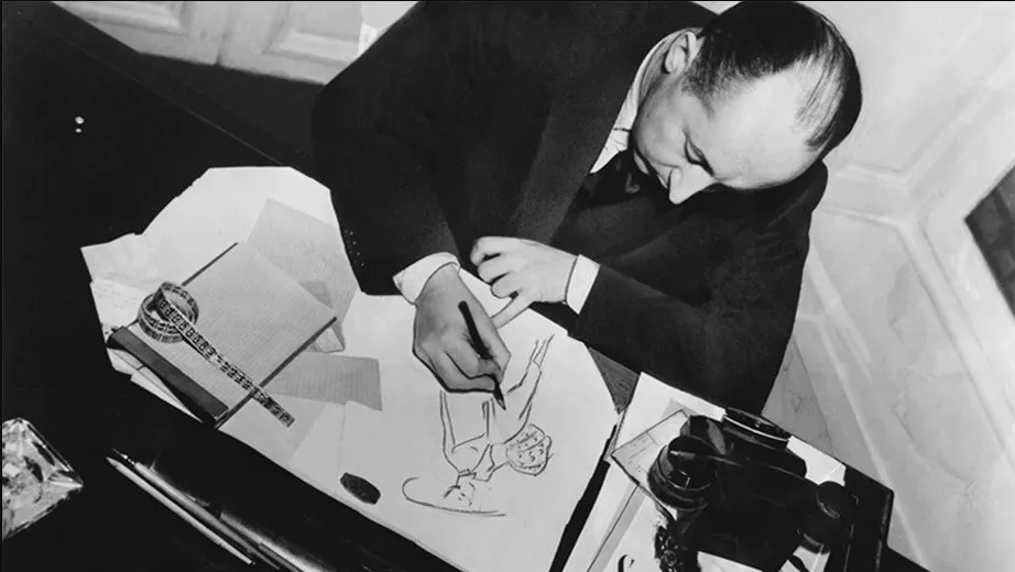 Christian Dior a desenhar. 